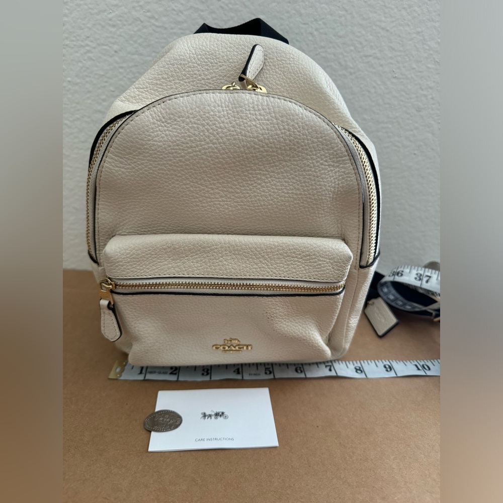Coach Court Ivory Pebbled Leather Mini Backpack.